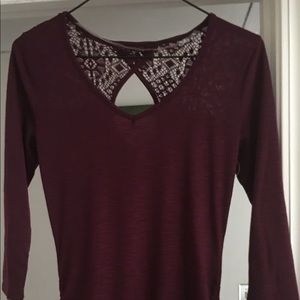 Drawstrings on the side giving a smaller waistline